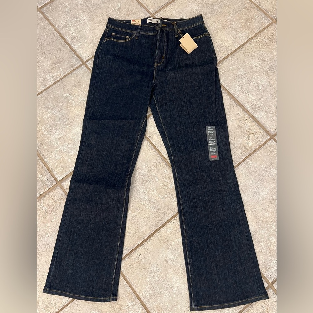 Levi’s bootcut 512. Dark denim. Never worn. Excellent shape